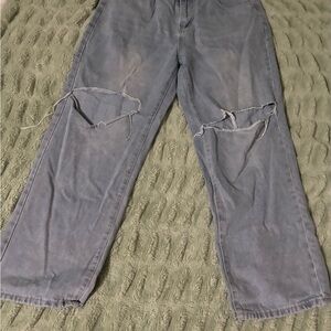 Distressed Blue Jeans